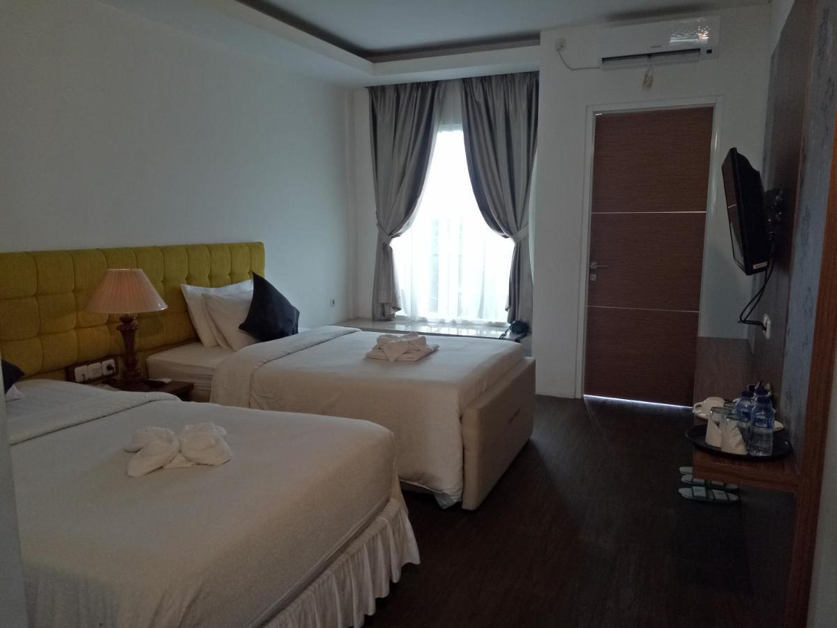 普卡 Graha Widjaja酒店 外观 照片